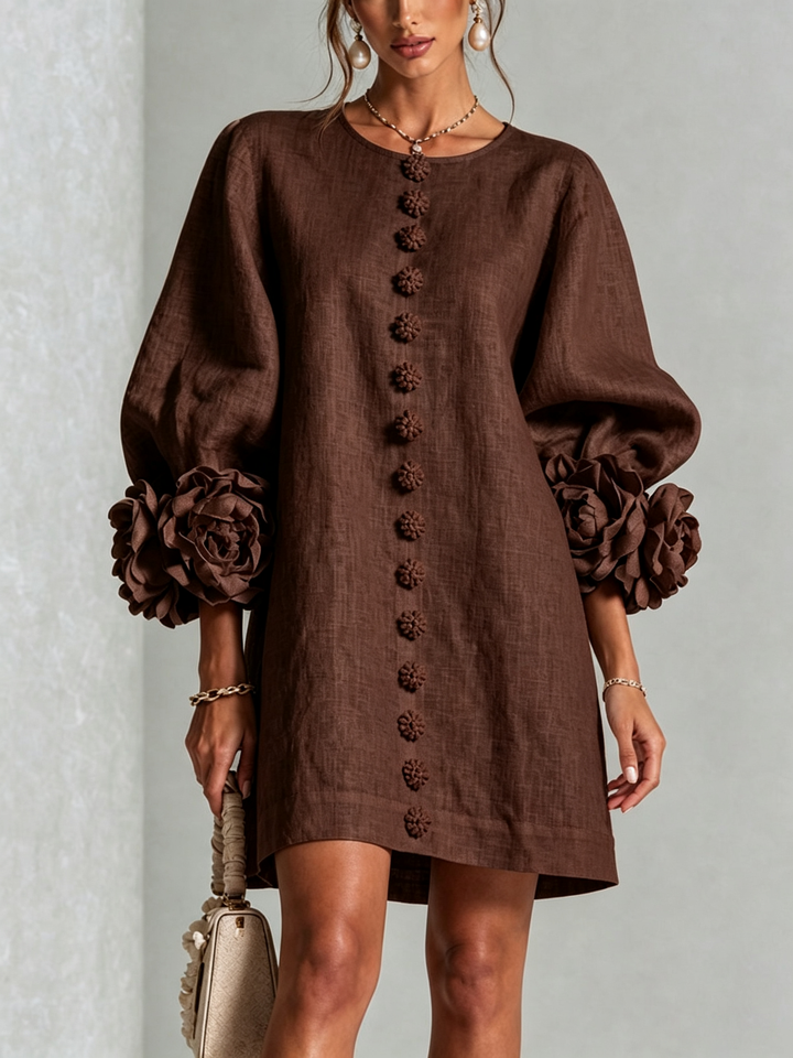 Versatile floral mini dress with long sleeves & round neck, day to night.