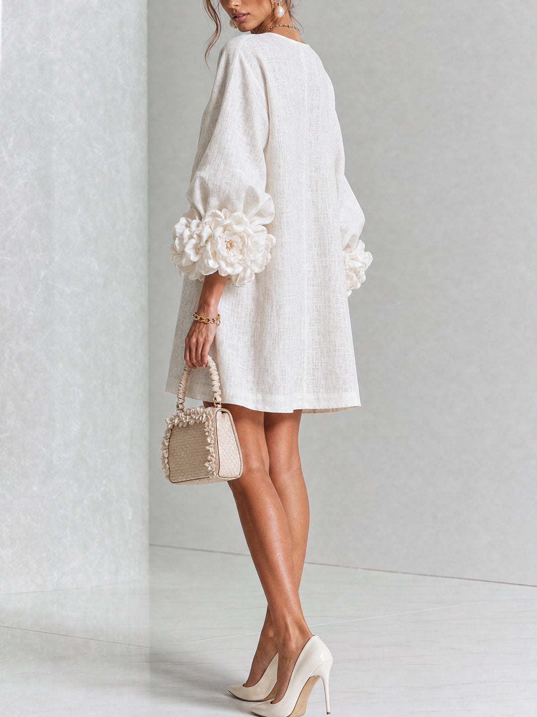 Elegant round neck long sleeve mini dress for women, ideal for summer.
