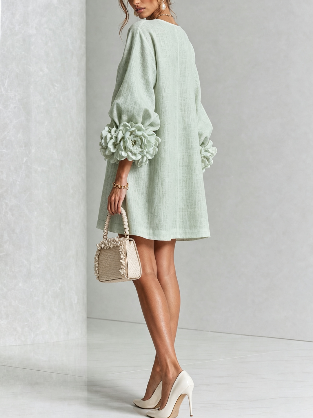 Elegant long sleeve mini dress with round neck, versatile for all events.