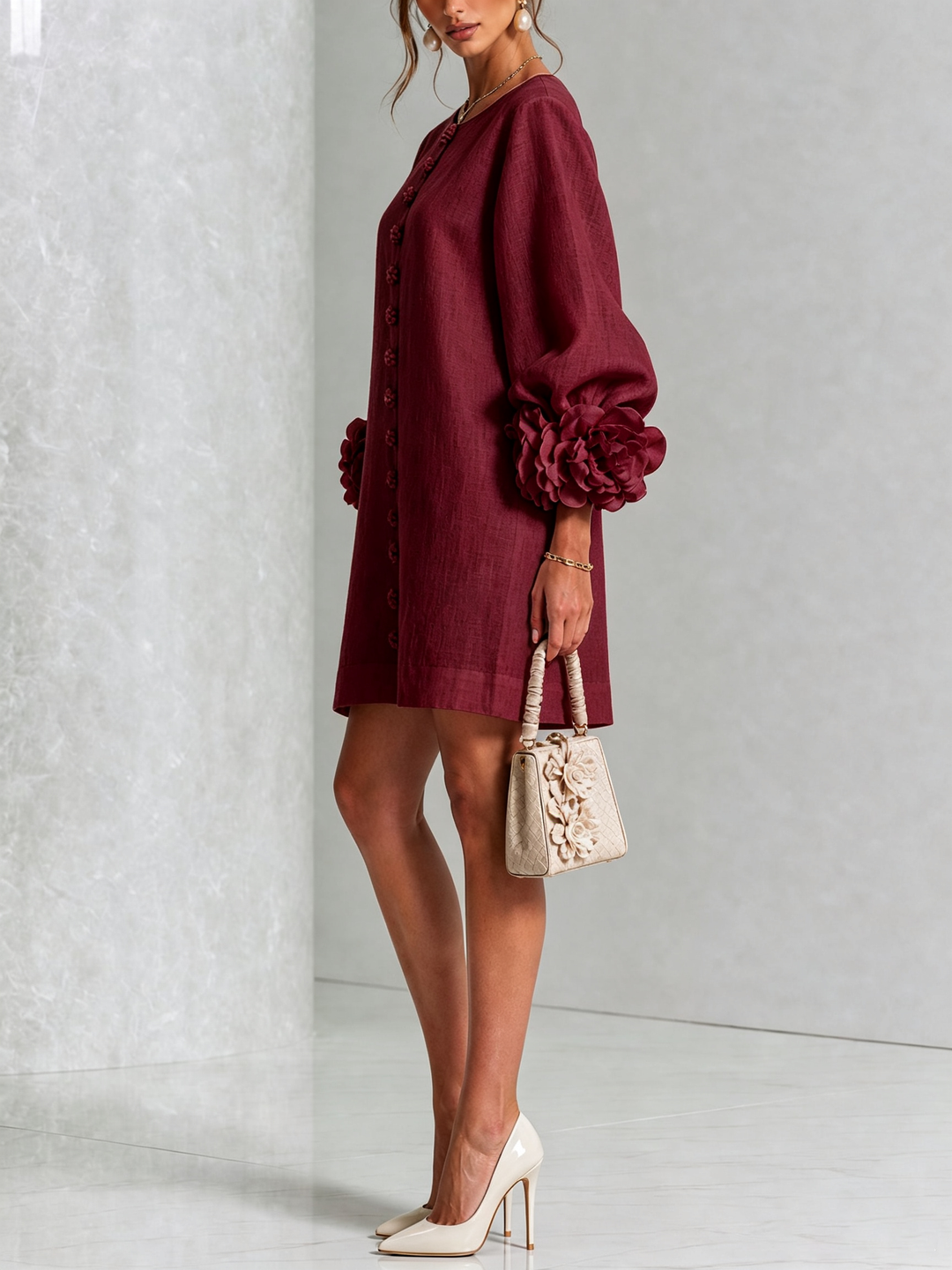 Spring/summer button-down long sleeve shift dress, a flowy silhouette.