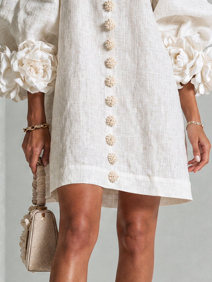 Chic round neck mini dress with button-down front, a modern look.