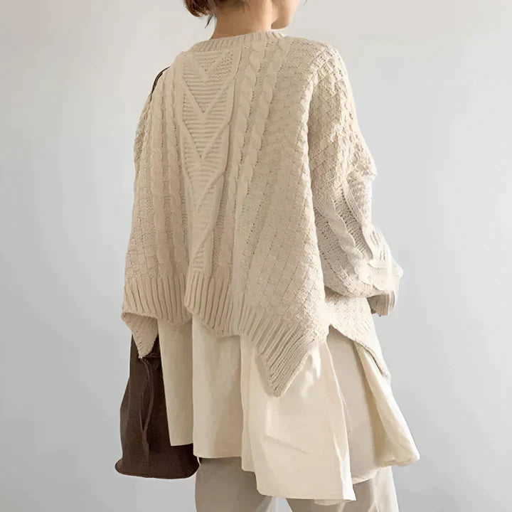Chic women's round neck sweater, elegant long sleeve top for winter fashion. Classic, comfortable, and versatile apparel.