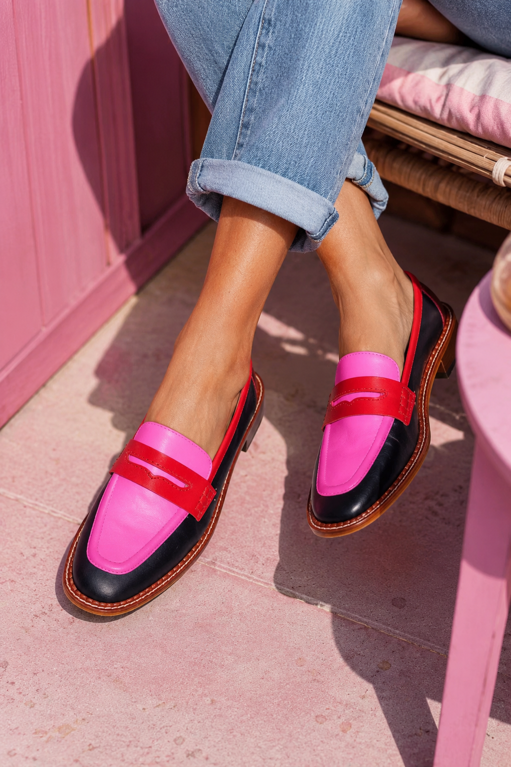 Pink women's penny loafers, round toe slip-on shoes with comfortable low heel. Stylish casual footwear.