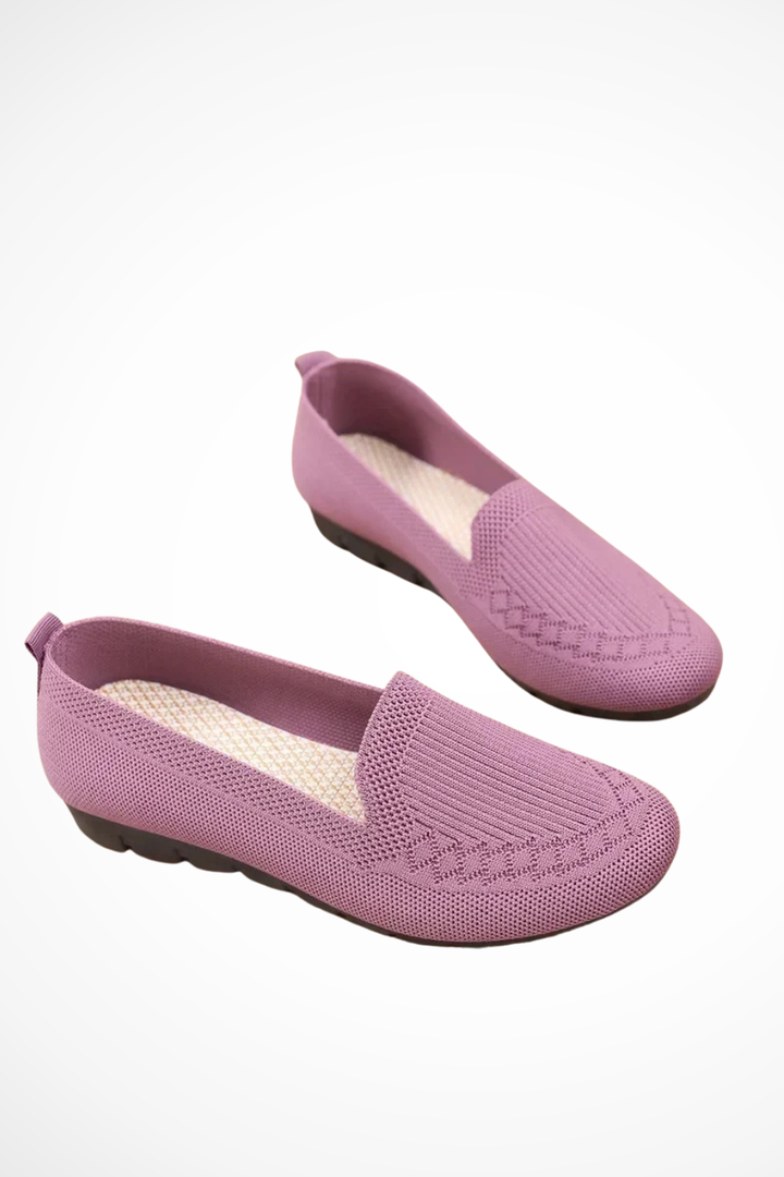 Pink round toe ballet flats, slip-on comfort shoes for women, great for casual outfits.