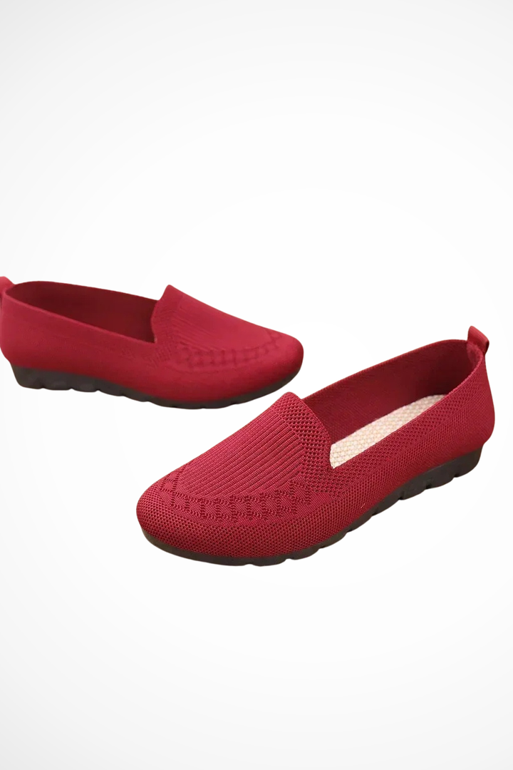 Stylish red round toe slip-on ballet flats, perfect for everyday fashion & comfort.