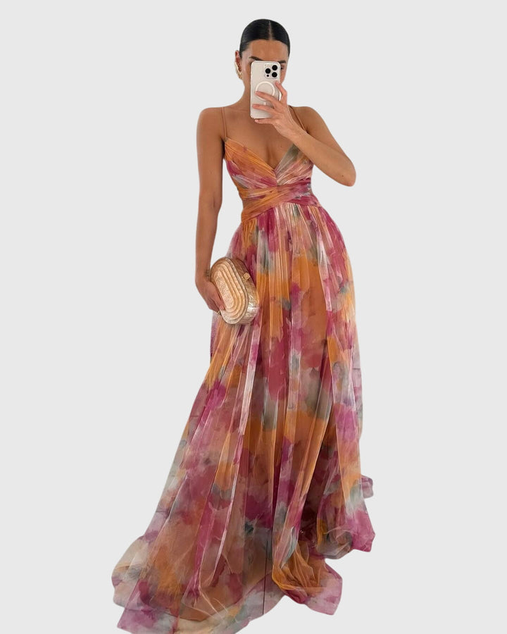 Women's ruched flowy maxi dress with adjustable straps, perfect for casual summer wear.