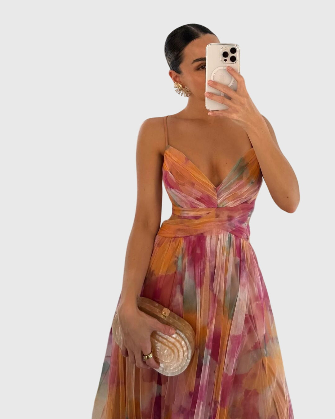Elegant women's flowy maxi dress featuring stylish ruching and comfortable adjustable straps.