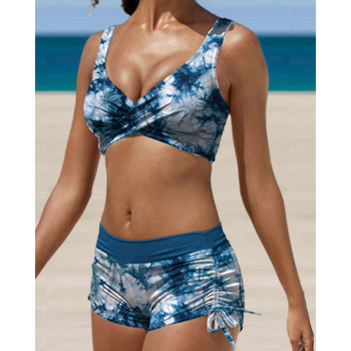 Camouflage print women's ruched shorts bikini set with adjustable straps, a trendy choice for summer swimwear.