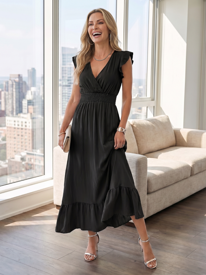 Elegant women's ruffle sleeve midi dress with smocked waist, ideal for versatile day-to-evening styling.