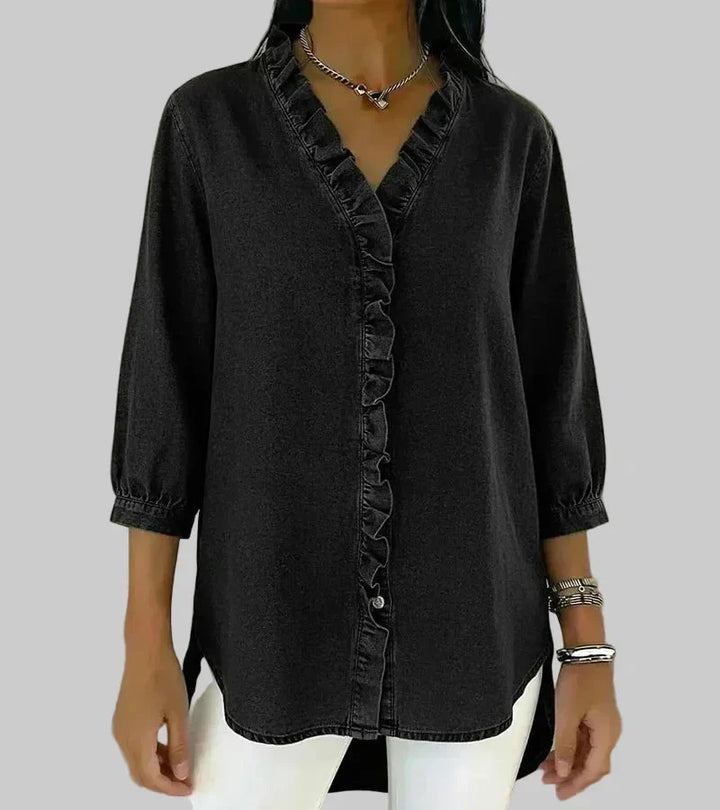 Stylish women's 3/4 sleeve ruffle blouse. Elegant v-neck & modern hi-low hem make it a versatile spring top.