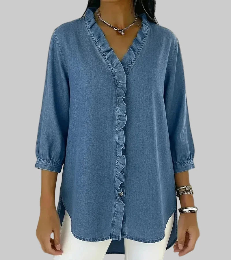 Comfortable women's v-neck top with playful ruffles, 3/4 sleeves, and a fashionable hi-low hem for any occasion.