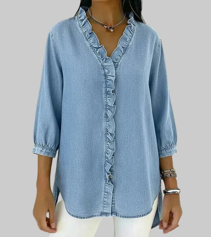 Full view of a women's elegant ruffle v-neck blouse with 3/4 sleeves & a flattering hi-low hem. Casual chic.