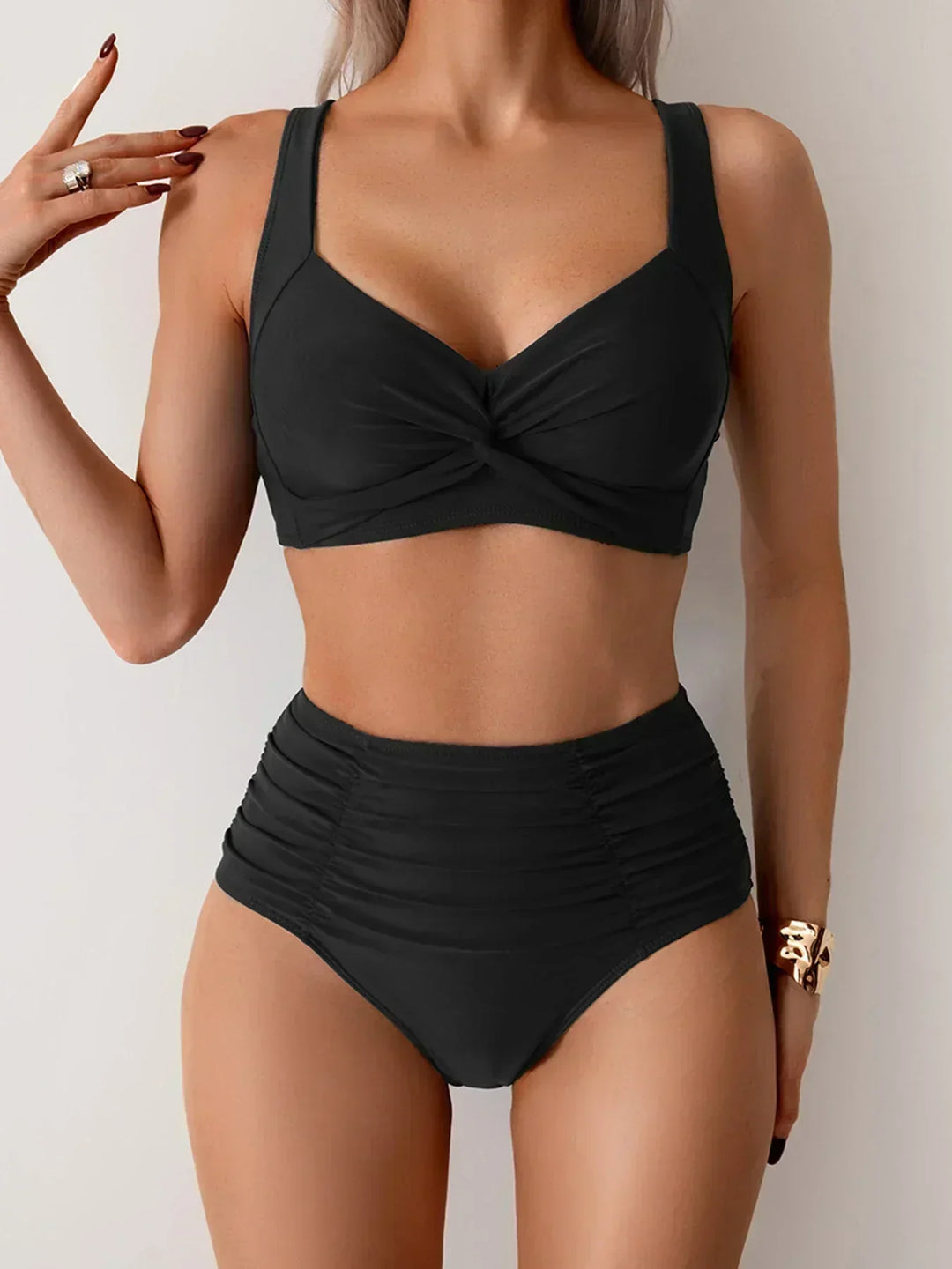 Chic women's strapless ruffled bandeau bikini. Elegant two-piece swimwear, ideal for summer beach essentials.
