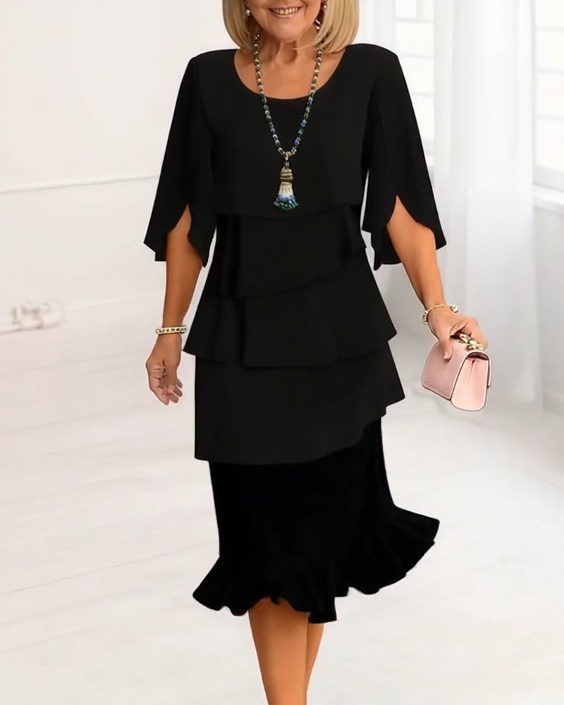 Women's ruffled tiered midi sundress, perfect for summer casual elegance. Sleeveless day dress style.