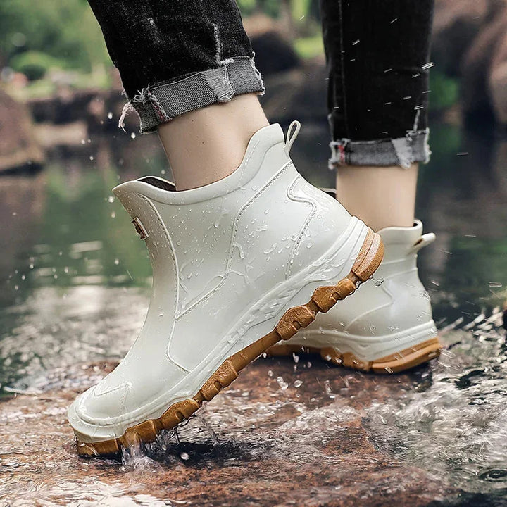 Women's waterproof ankle rain boots, slip-resistant lug sole, great for casual wet weather outdoor wear.
