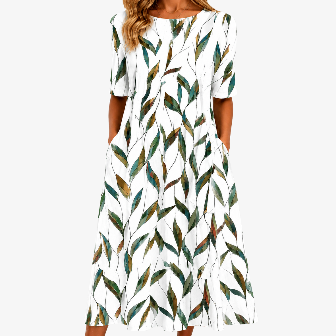 Women's sage green botanical print midi dress with pockets, elegant & casual for summer/spring fashion.