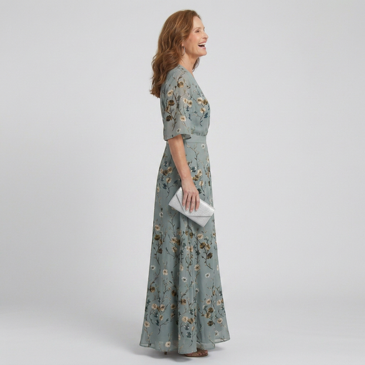 Elegant women's halter bloom flow maxi dress in sage green floral print. Ideal for summer casual, party, or vacation.