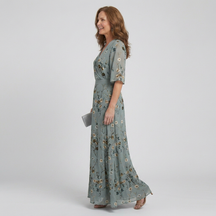 Sage green floral print women's halter maxi dress, a stylish & comfortable flowy dress for summer events.