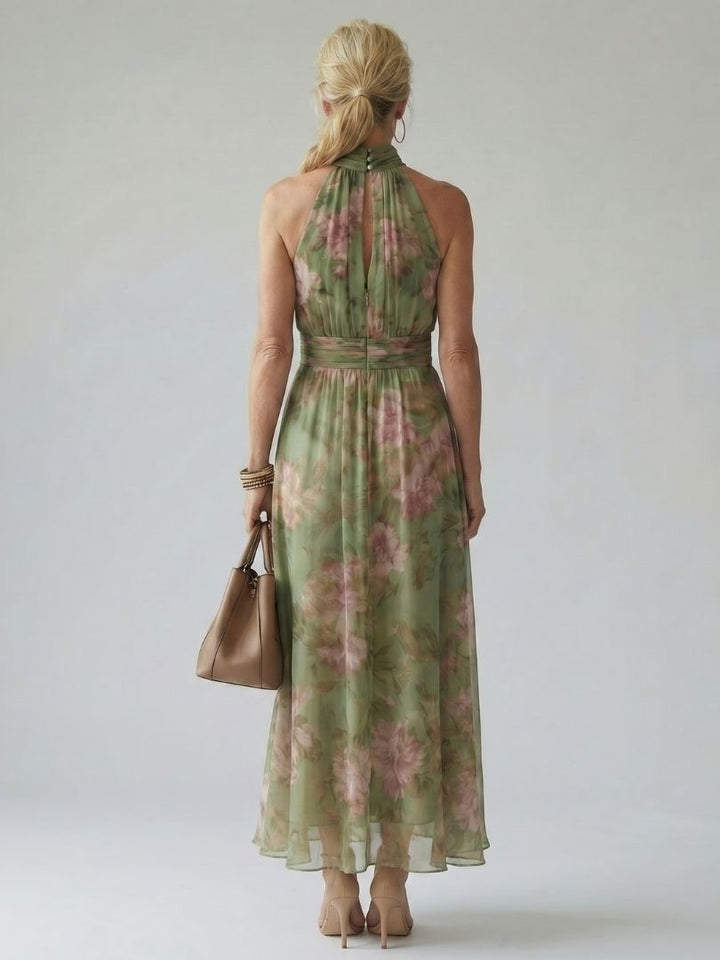 Women's feminine halter neck midi dress with a beautiful floral print, comfortable and stylish.