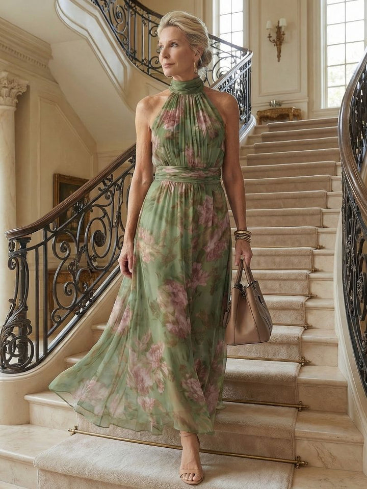 Lightweight floral halter neck midi dress, offering feminine style for summer garden parties.