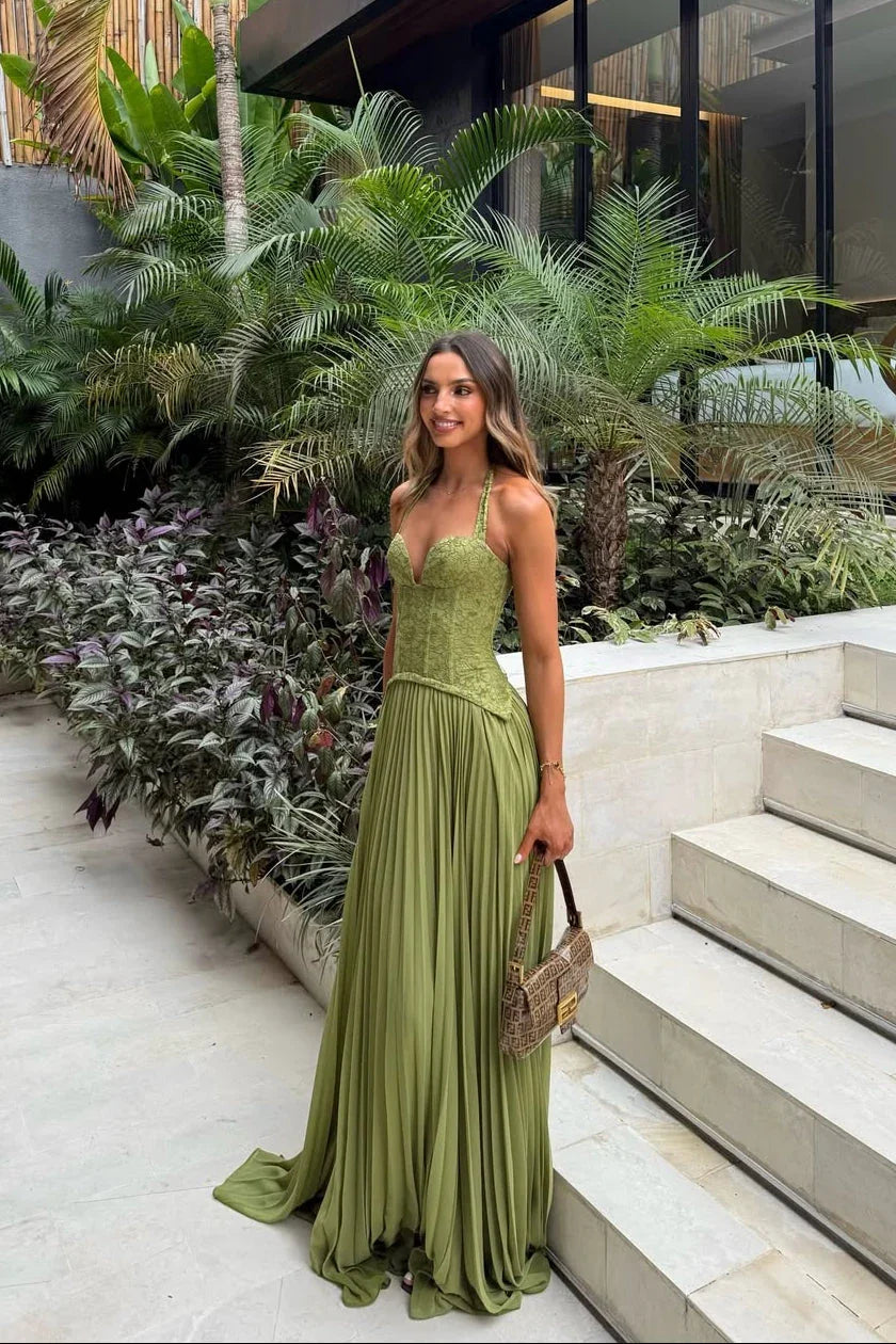 Women's sage green pleated corset maxi evening dress, elegant and formal occasion wear.