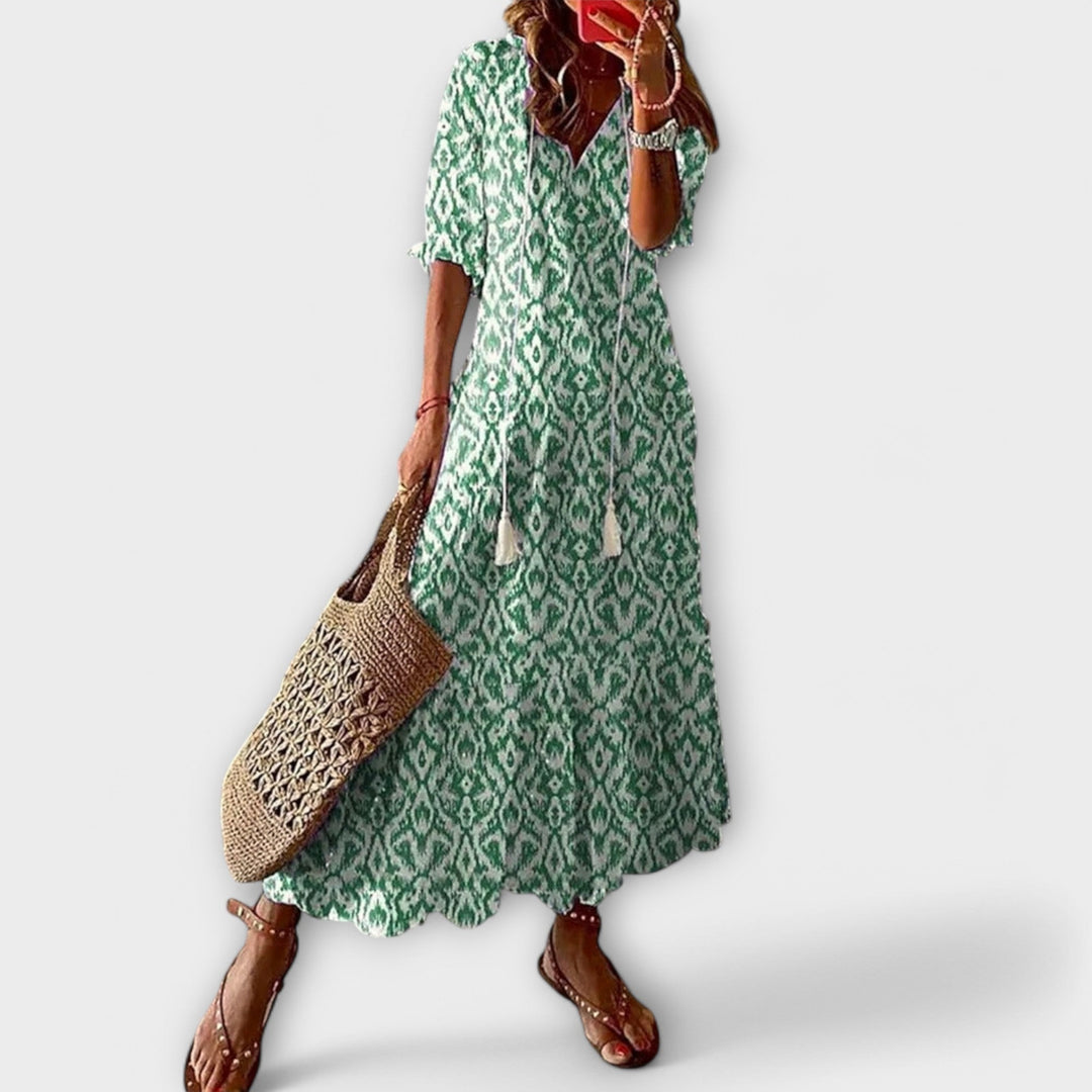Boho chic Savannah maxi dress for women, featuring a vibrant printed design, ideal for summer fashion.