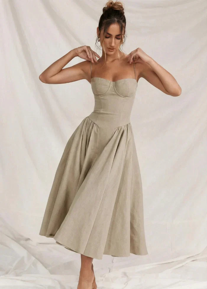 Elegant blue sculpted corset dress for women. Bodycon evening gown, ideal for cocktails & formal wear. Fitted design.