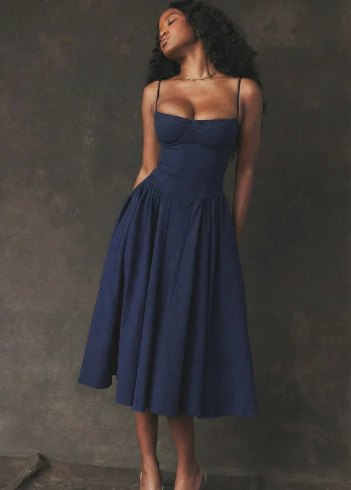 Women's formal beige sculpted corset dress. Bodycon fit evening gown, perfect for special occasions & elegant style.