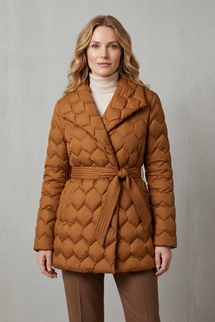 Caramel women's quilted puffer jacket, belted for a sculpted fit. Stylish everyday fall & winter outerwear.