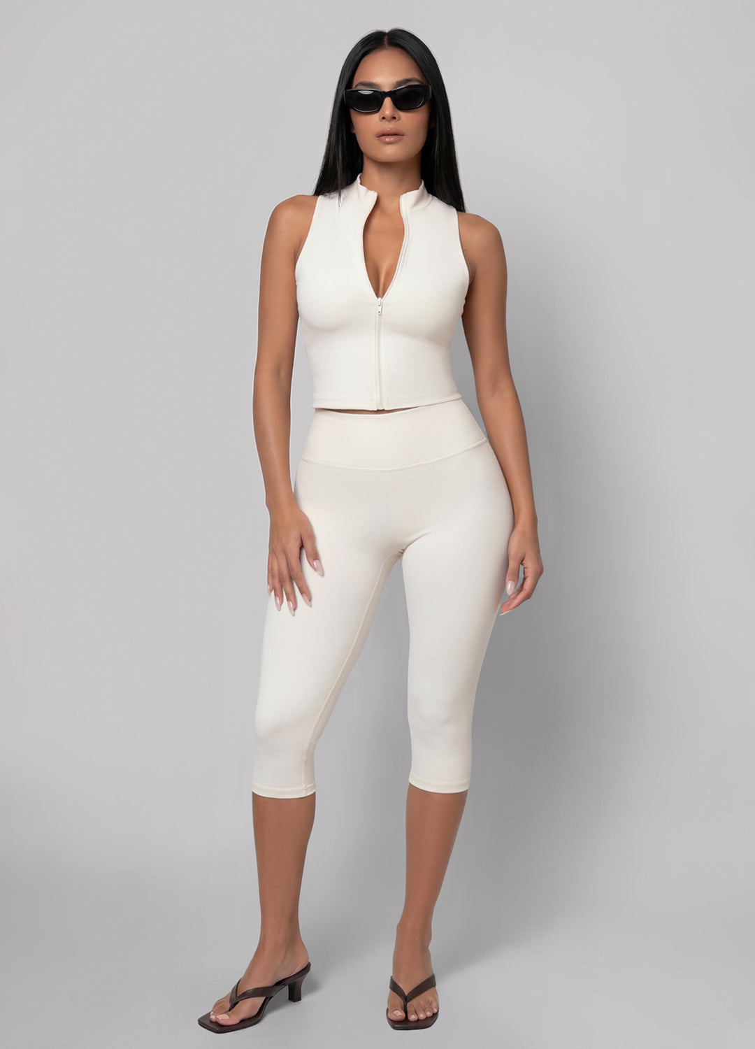 High-waisted ivory capri leggings for women, designed for activewear, athleisure, and comfortable loungewear.