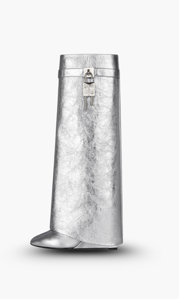 Unique sculptural women's knee-high boots, glossy black, with a stylish wedge.