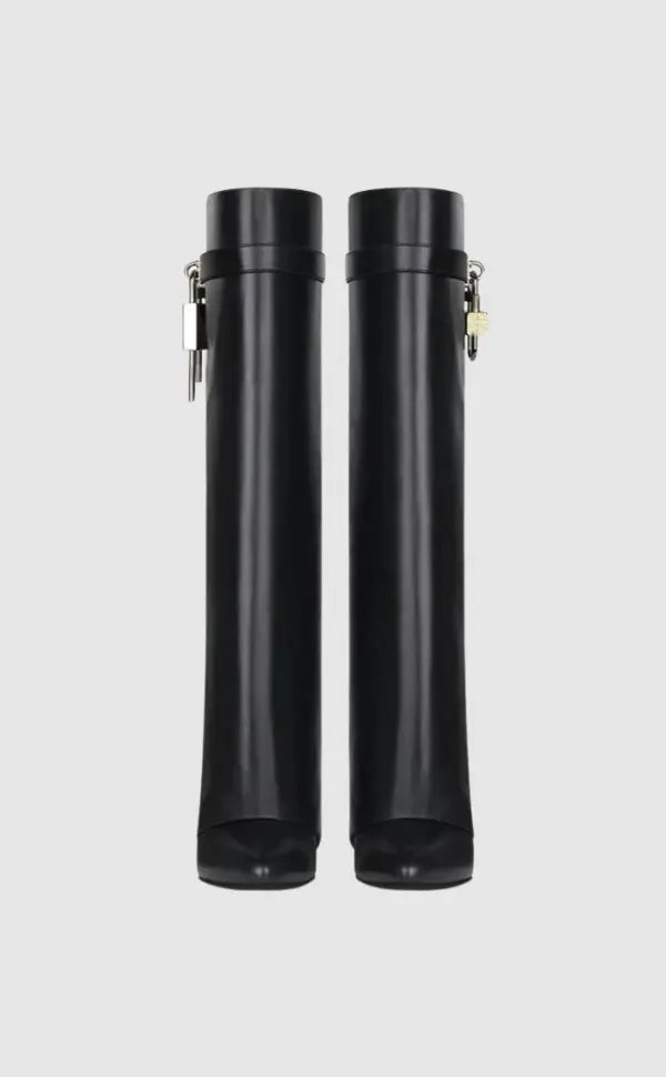 Glossy black wedge knee-high boots for women; a bold and contemporary fashion statement.