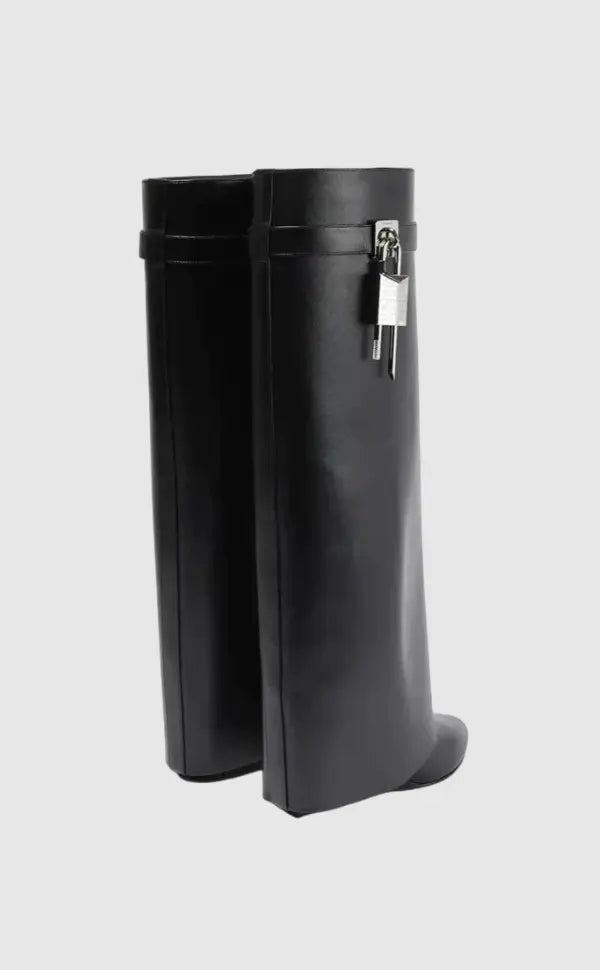 Sculptural women's long boots with a sleek, glossy finish and comfortable wedge.