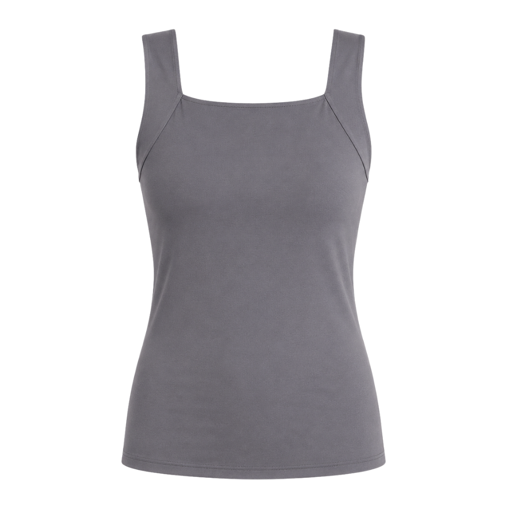 Fitted women's seamless shaper tank with built-in bra, providing smooth support & shape.