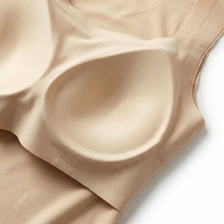 Seamless women's built-in bra shaper tank, ideal layering piece for a smooth silhouette.