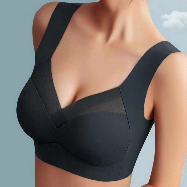 Model demonstrating the flexibility and comfort of a seamless everyday bra.