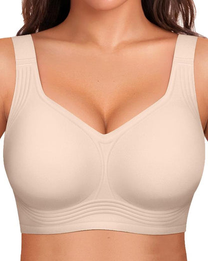 Nude seamless wireless bra with full coverage, ideal as comfortable everyday support lingerie.