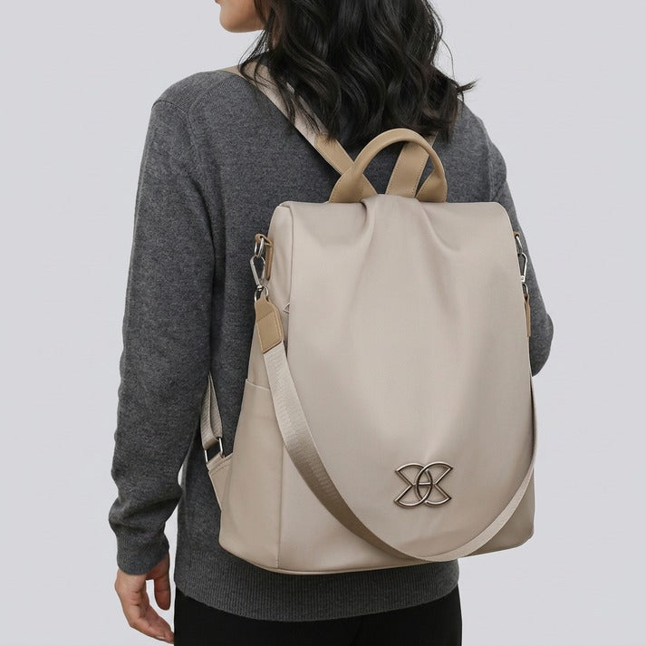 Organized interior of a women's anti-theft shoulder bag, with space for all your secure everyday items.