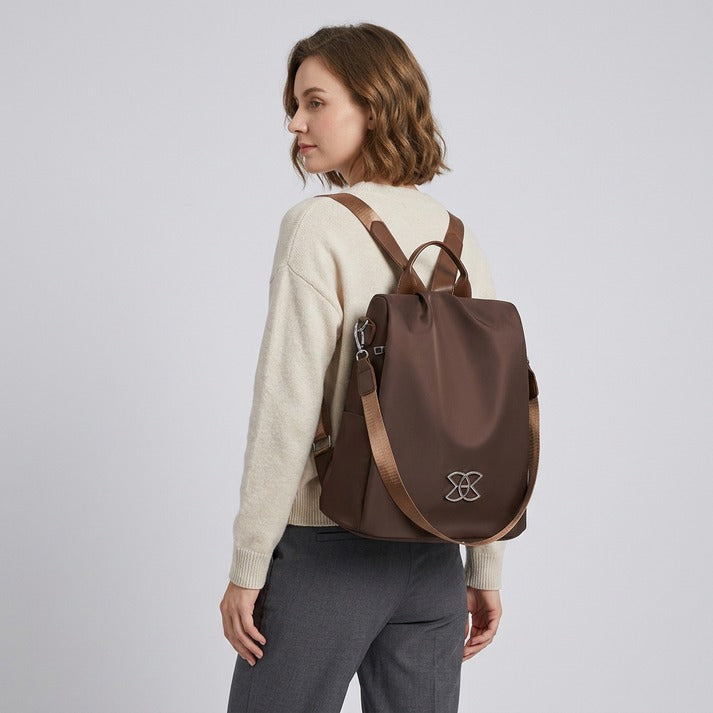 Practical women's anti-theft shoulder bag for travel & daily errands, offering peace of mind and style.
