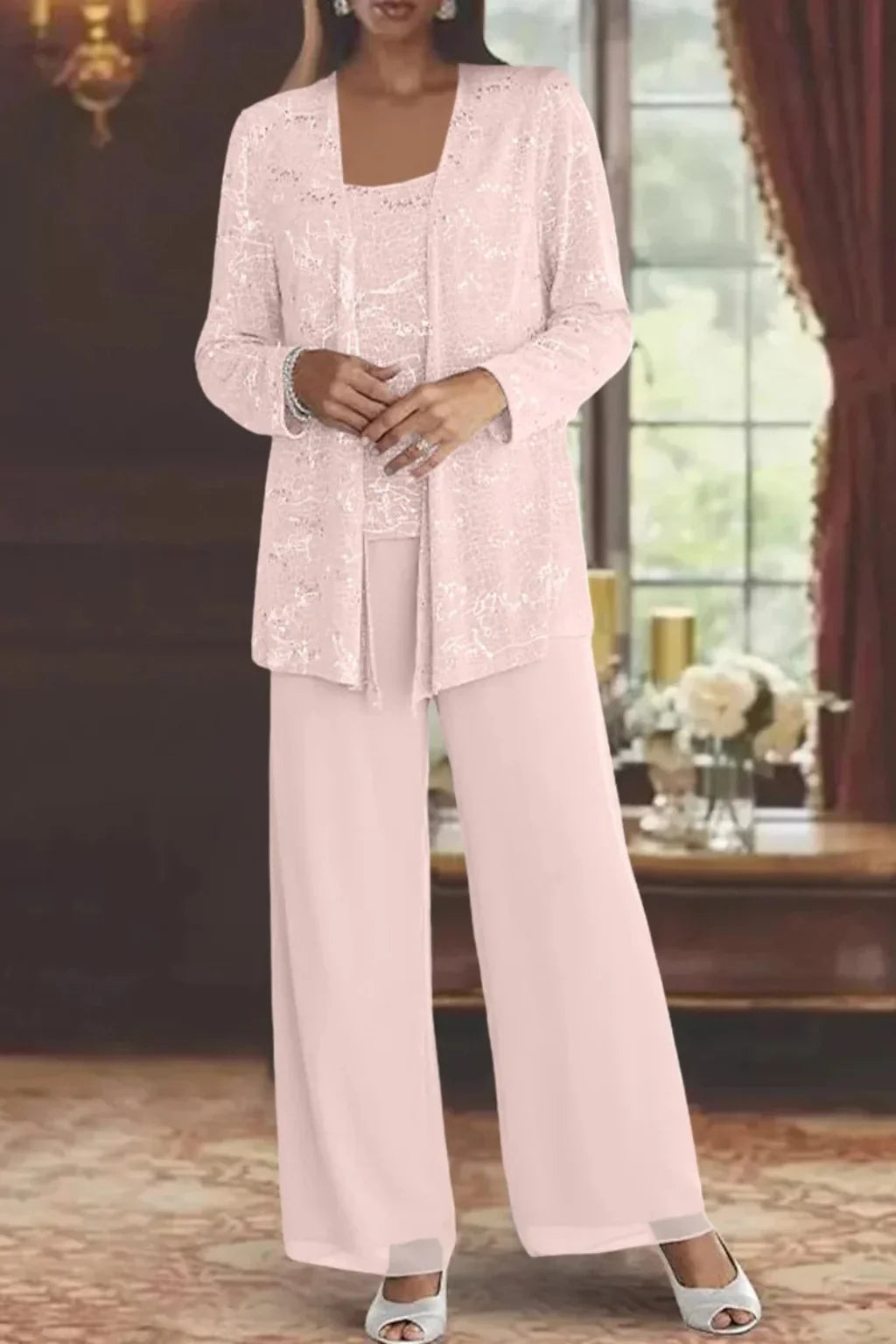 Sparkling women's sequin three-piece set. Dazzling jacket, top & wide leg pants. Perfect for evening fashion.