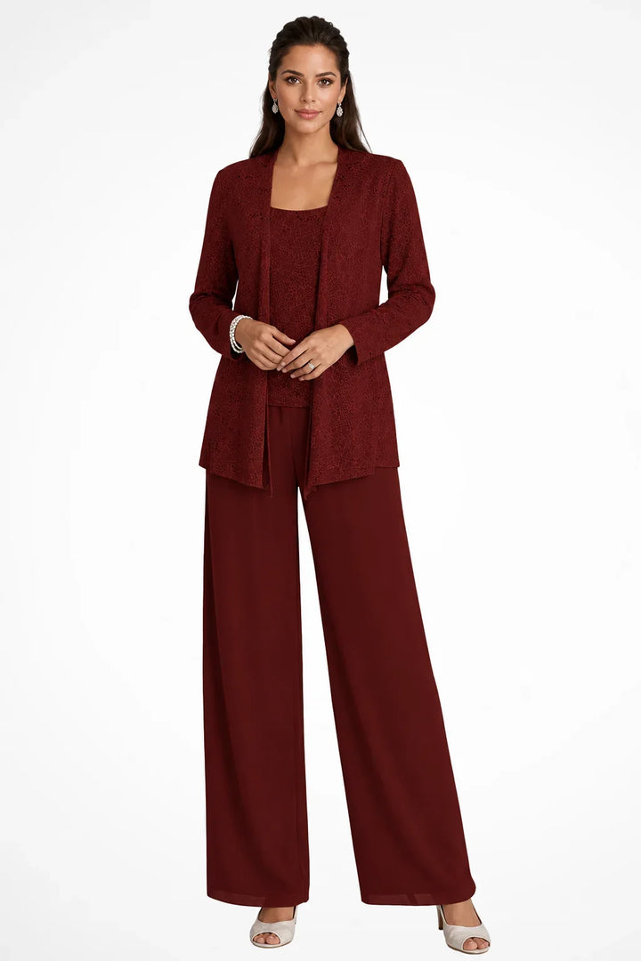 Modern women's sequin three-piece pantsuit. Stylish jacket, top & wide leg pants offer a glamorous look.