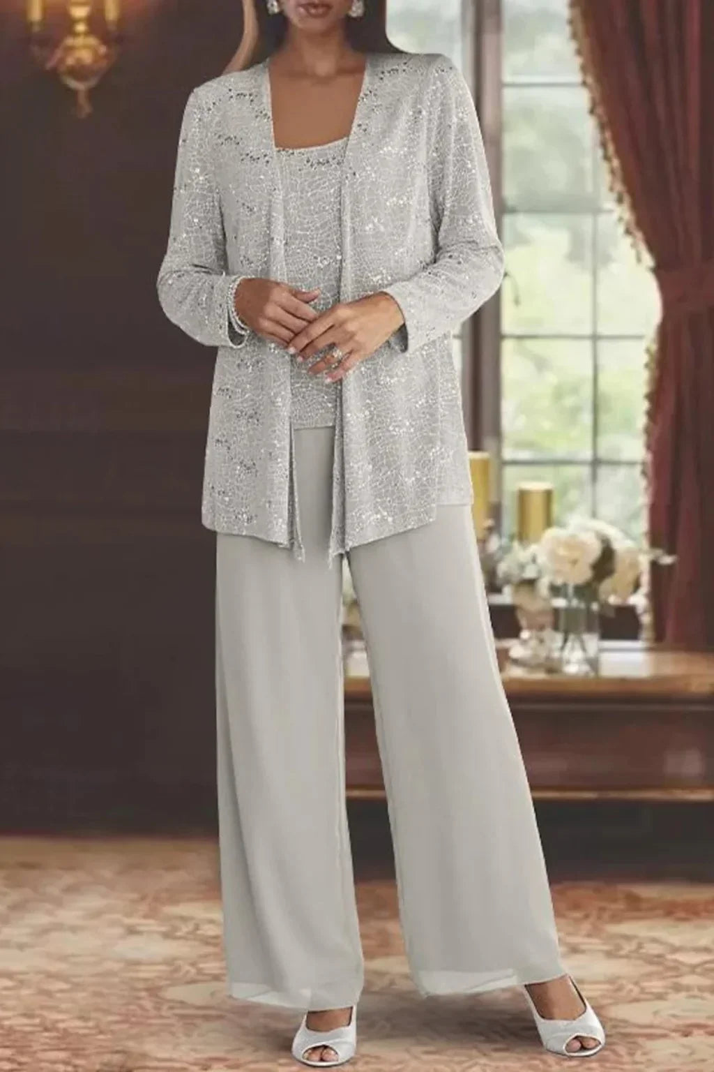 Elegant women's sequin three-piece set. Coordinated jacket, top & wide leg pants for a glamorous party outfit.