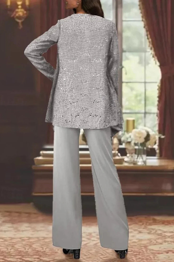 Sparkling women's sequin jacket, part of a chic three-piece set with a matching top & wide leg pants. Party outfit.