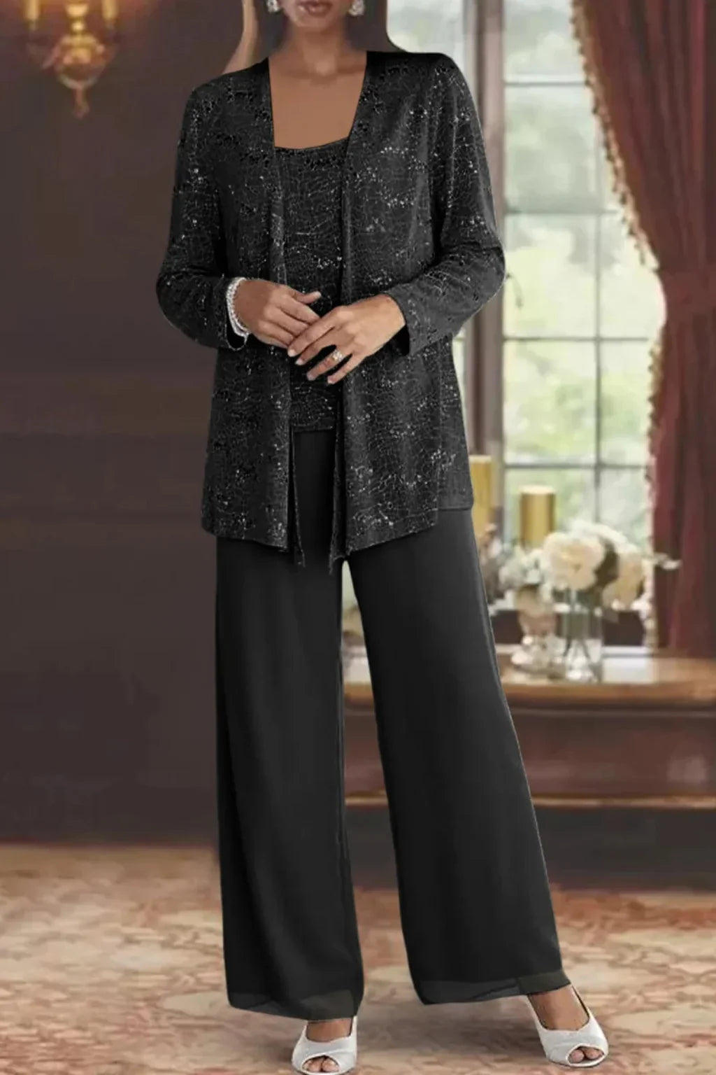Celebration-ready women's sequin three-piece set. Dazzling jacket, top & wide leg pants for glamorous events.