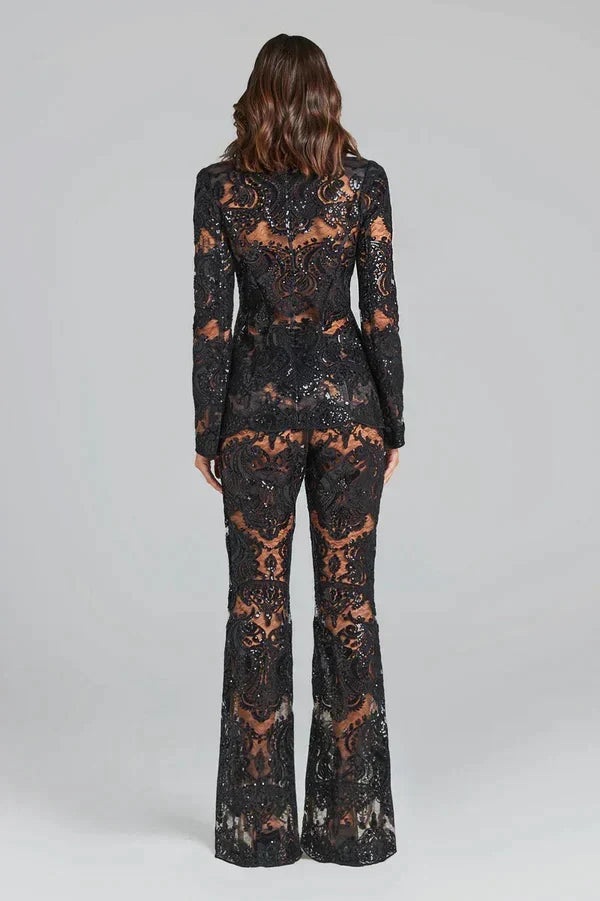 Elegant black sheer blazer and matching flared trousers set, ideal for special occasions & formal evening attire.