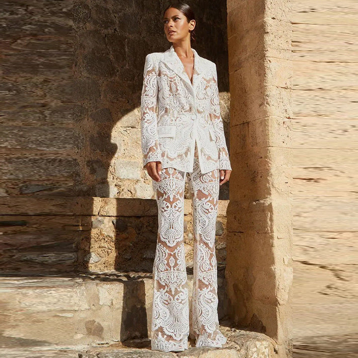 Fashionable women's sheer blazer & high-waisted flared trousers, creating a modern, elegant two-piece suit.