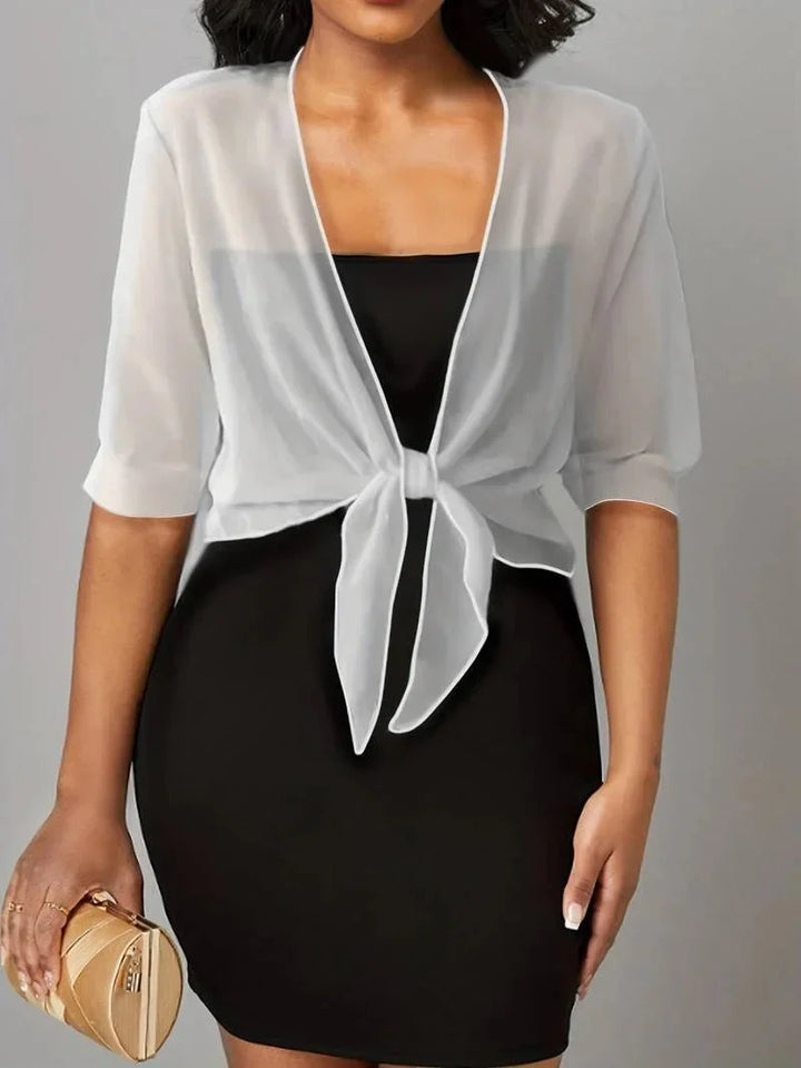Women's sheer tie-front blouse with 3/4 sleeves, perfect for summer layering and style.