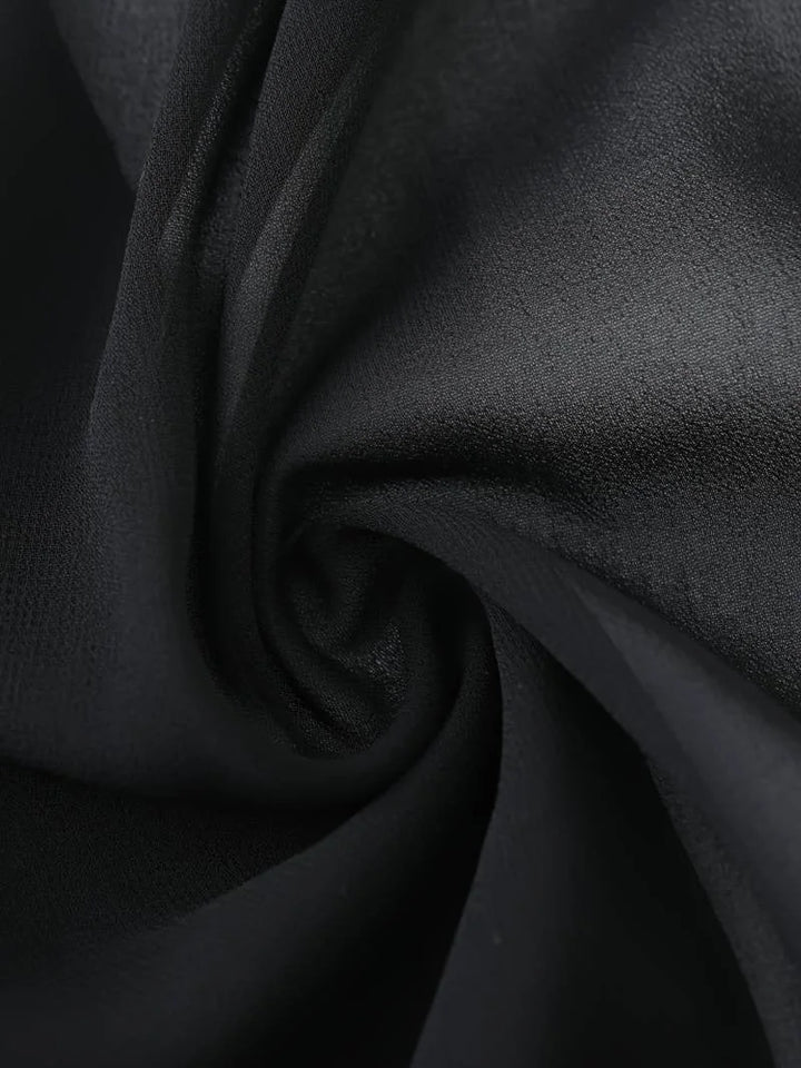Women's open-front sheer blouse with 3/4 sleeves and stylish tie detail.