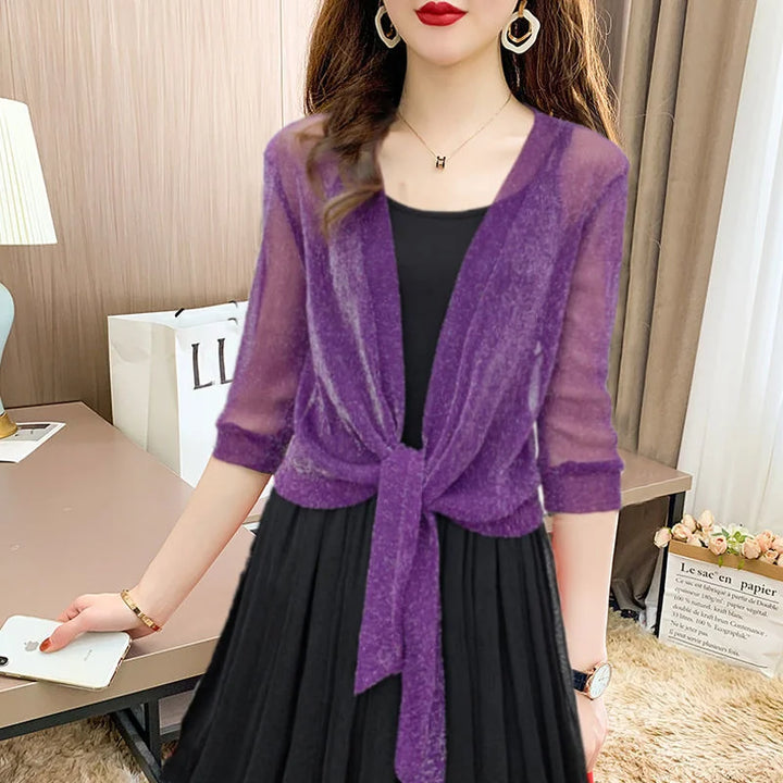 Versatile sheer tie-front blouse for women, featuring 3/4 sleeves and open front.