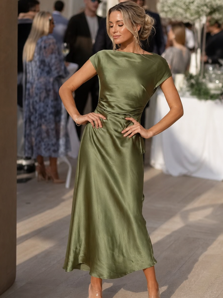 Women's short sleeve boat neck fitted midi dress, elegant & flattering for office, party, or casual wear.